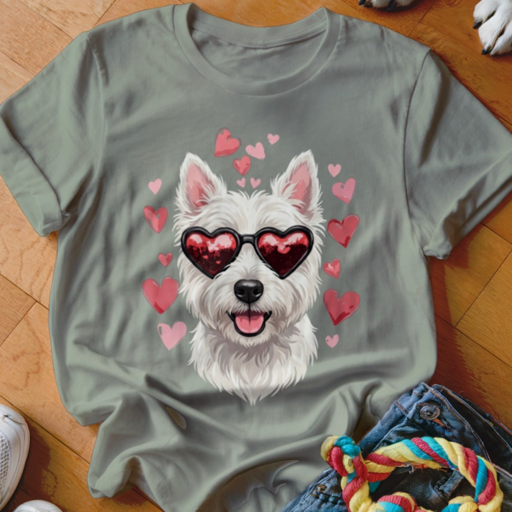 Sage green t-shirt featuring a West Highland White Terrier wearing heart-shaped sunglasses surrounded by floating pink hearts.