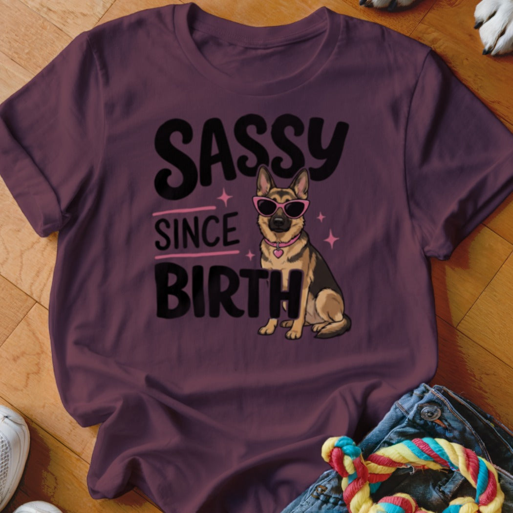 German Shepherd wearing sunglasses with text "SASSY SINCE BIRTH".