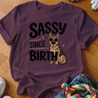 German Shepherd wearing sunglasses with text "SASSY SINCE BIRTH".