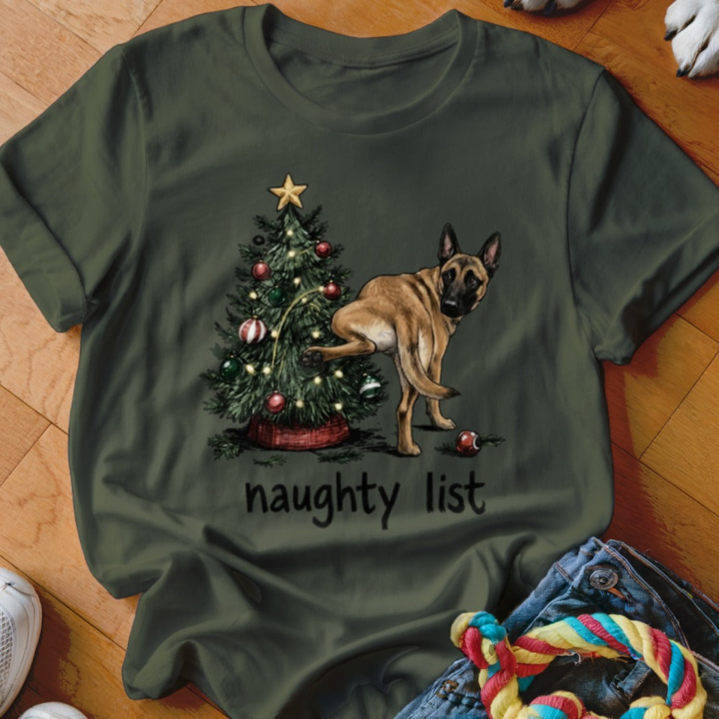 Dog lifting leg on Christmas tree with text "naughty list"