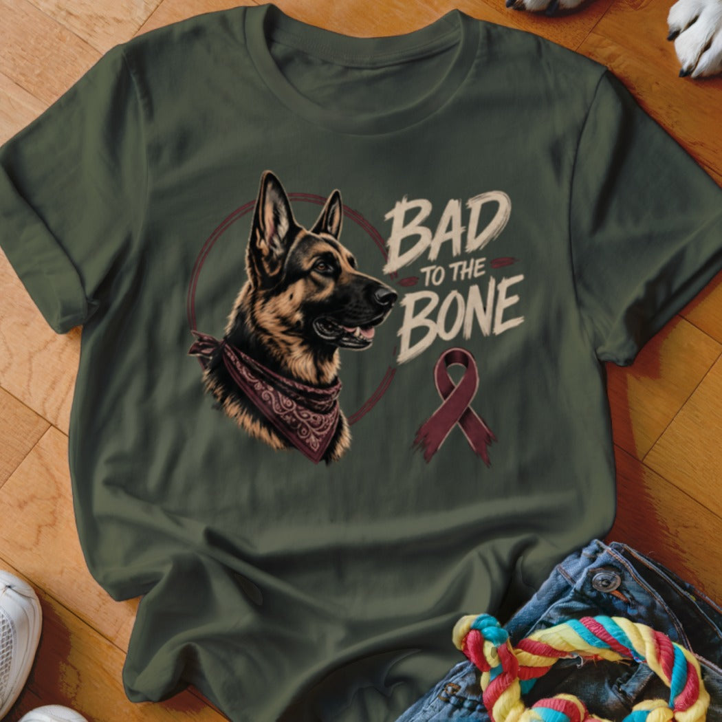 German Shepherd graphic with "Bad to the Bone" text and burgundy ribbon on green shirt.