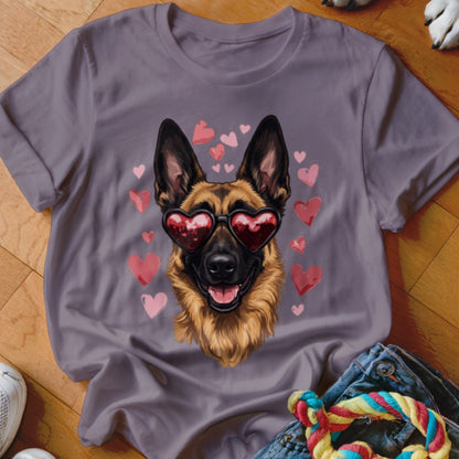 A grey t-shirt featuring a graphic of a German Shepherd wearing heart-shaped sunglasses surrounded by pink hearts.