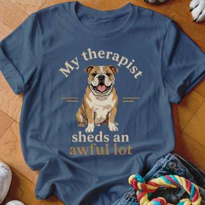 T-shirt with illustration of bulldog and text "My therapist sheds an awful lot."