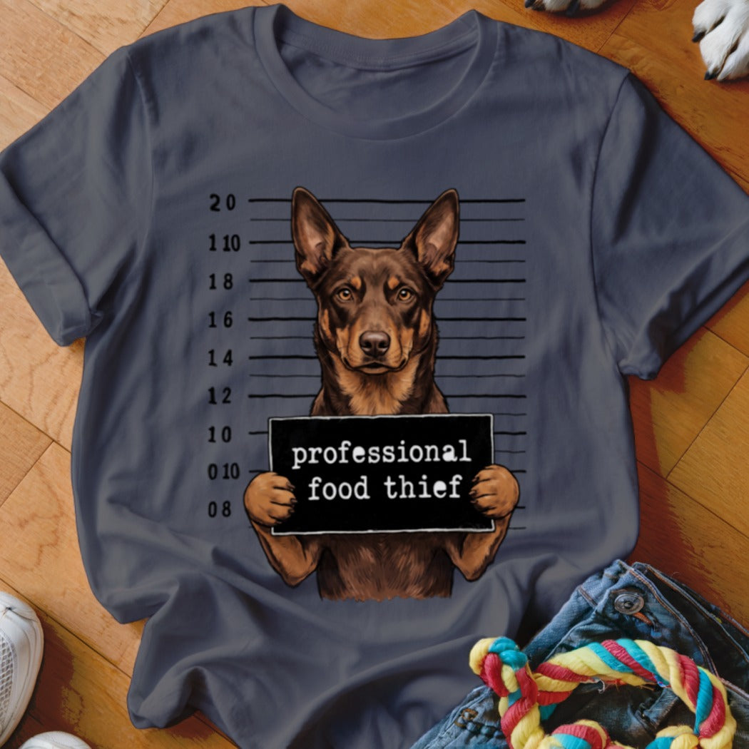 Brown dog mugshot with "professional food thief" sign and mugshot grid.