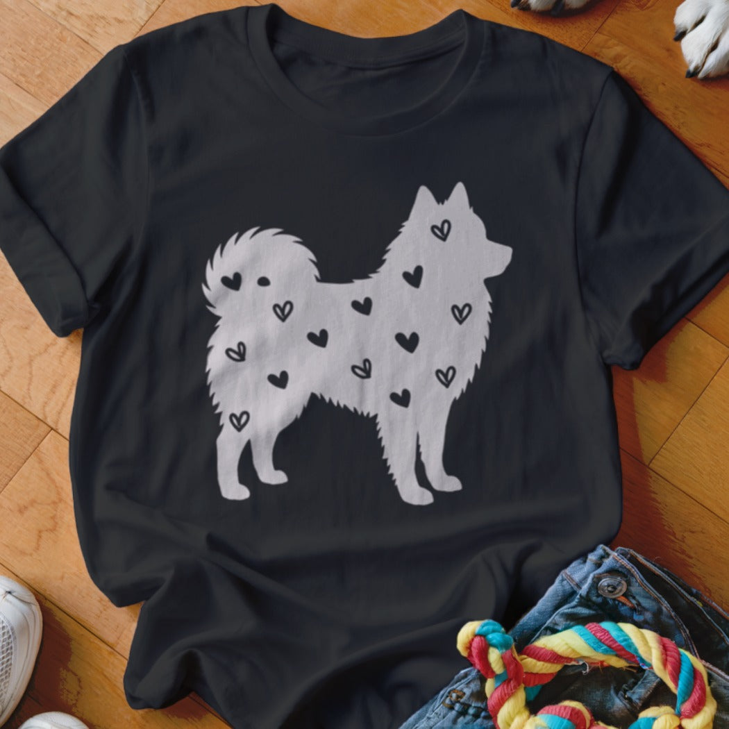 Black t-shirt with a white silhouette of a dog covered in small black hearts.