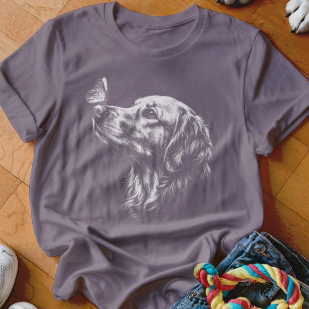 Purple crewneck t-shirt featuring a white line drawing of a golden retriever looking at a butterfly.