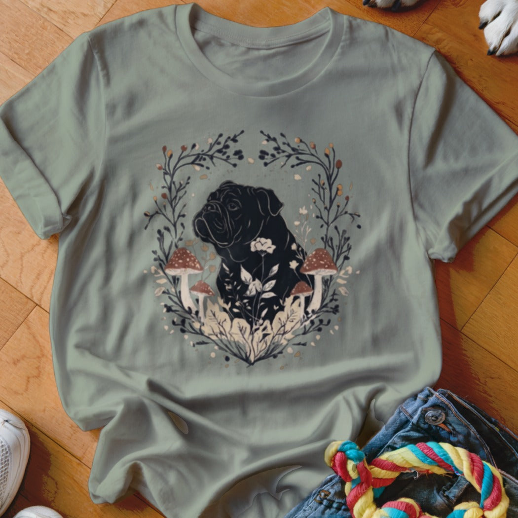 Sage green crewneck t-shirt featuring a black dog graphic surrounded by botanical illustrations.