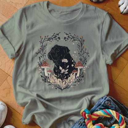 Sage green crewneck t-shirt featuring a black dog graphic surrounded by botanical illustrations.