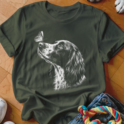 Dark green crewneck t-shirt featuring a white sketch of a spaniel looking at a butterfly on its nose.
