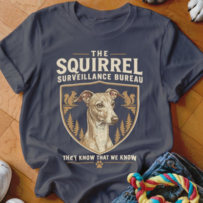 Dark grey t-shirt featuring a graphic crest of an Italian Greyhound, pine trees, squirrels, and humorous text.