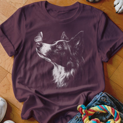Maroon crewneck t-shirt featuring a white line drawing of a Border Collie looking up at a butterfly.