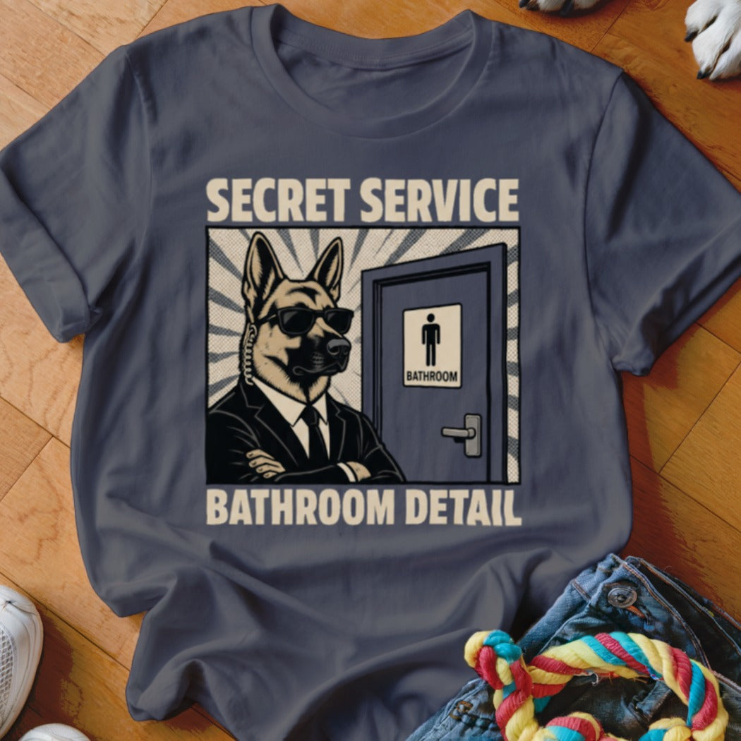 German Shepherd in suit and sunglasses by a bathroom door, "Secret Service Bathroom Detail."