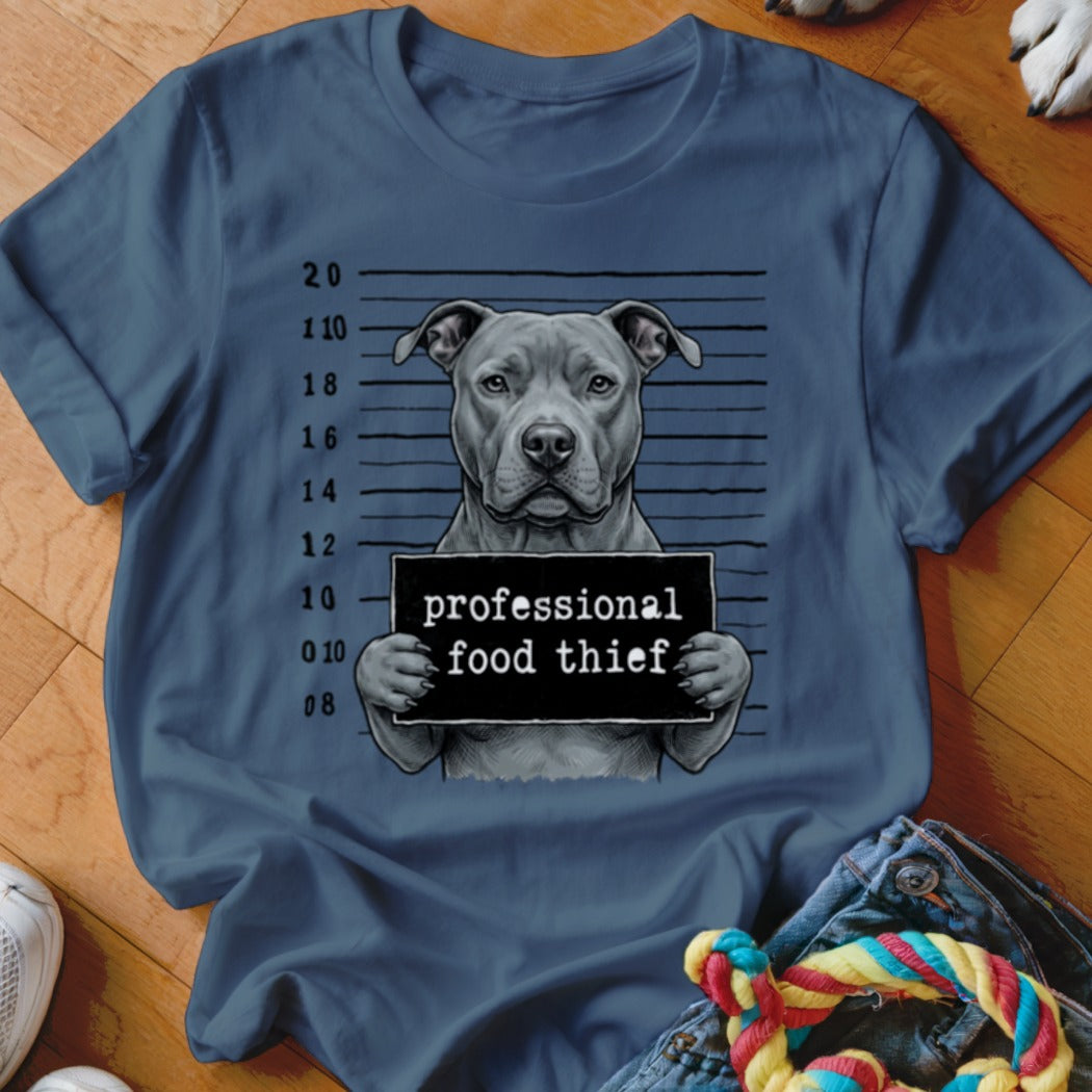 Pit bull dog mugshot holding sign: "professional food thief"