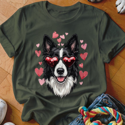 Dark green t-shirt featuring a graphic of a black and white dog wearing heart-shaped sunglasses surrounded by pink hearts.