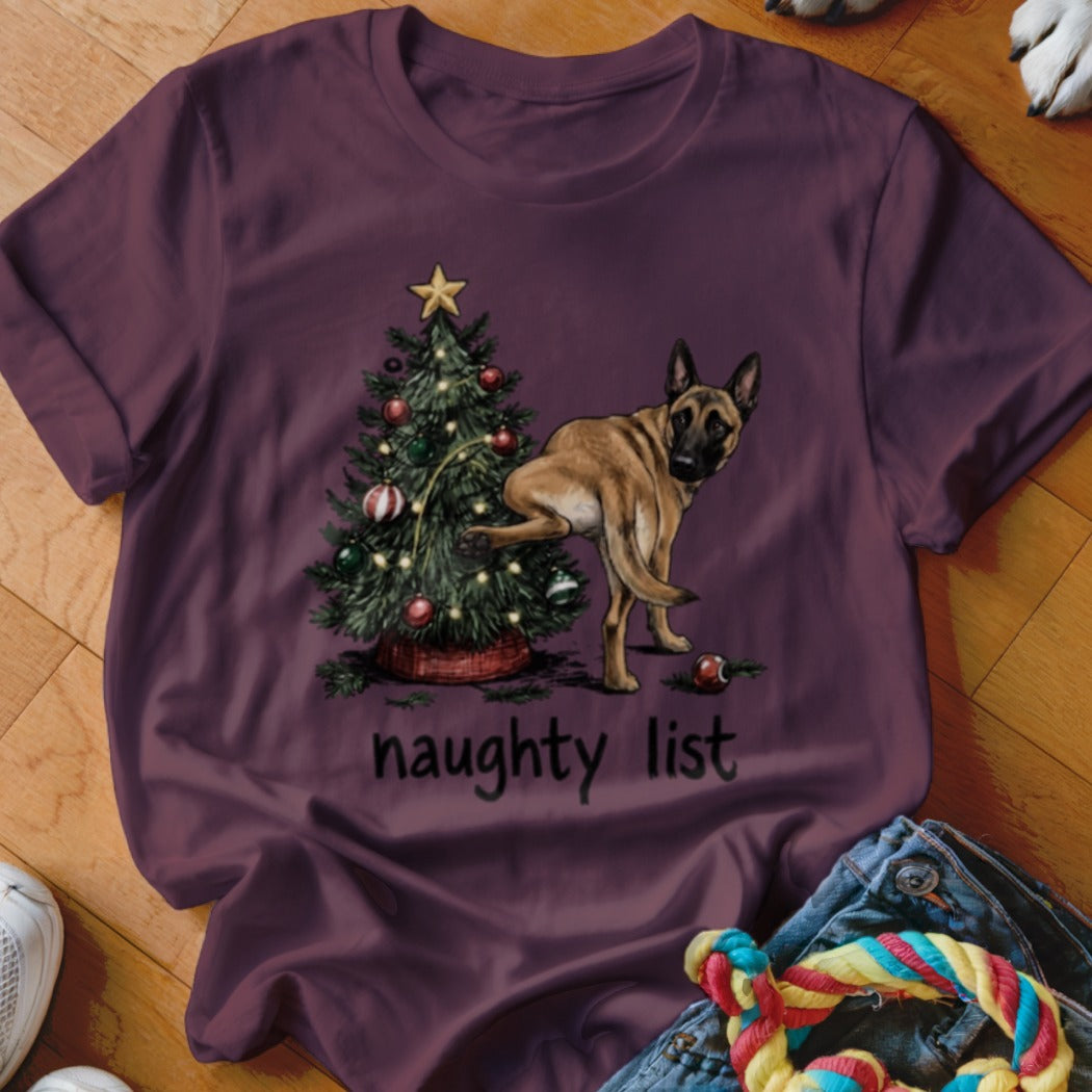 T-shirt with dog near Christmas tree and text "naughty list"
