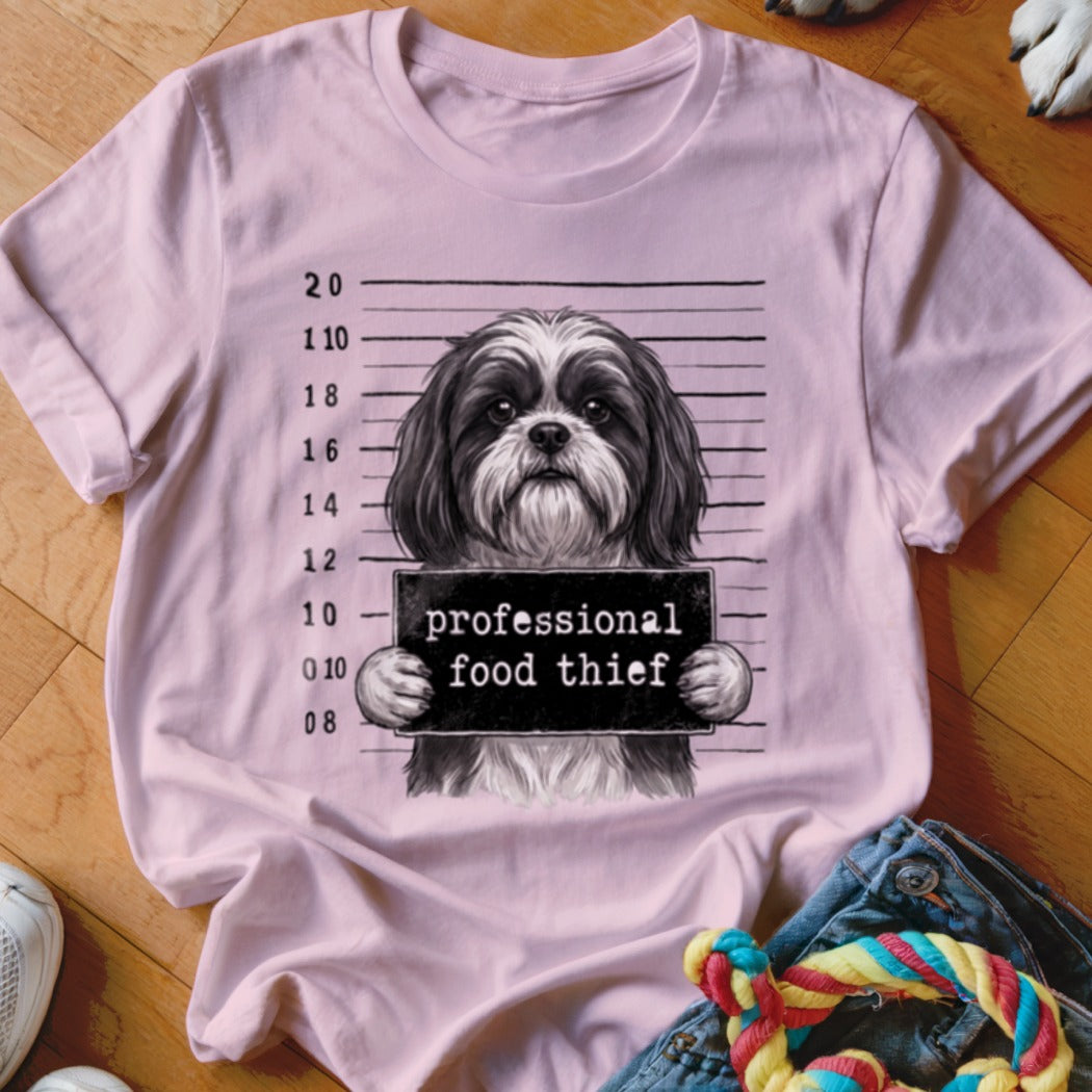 Pink t-shirt with a Shih Tzu mugshot holding a "professional food thief" sign.