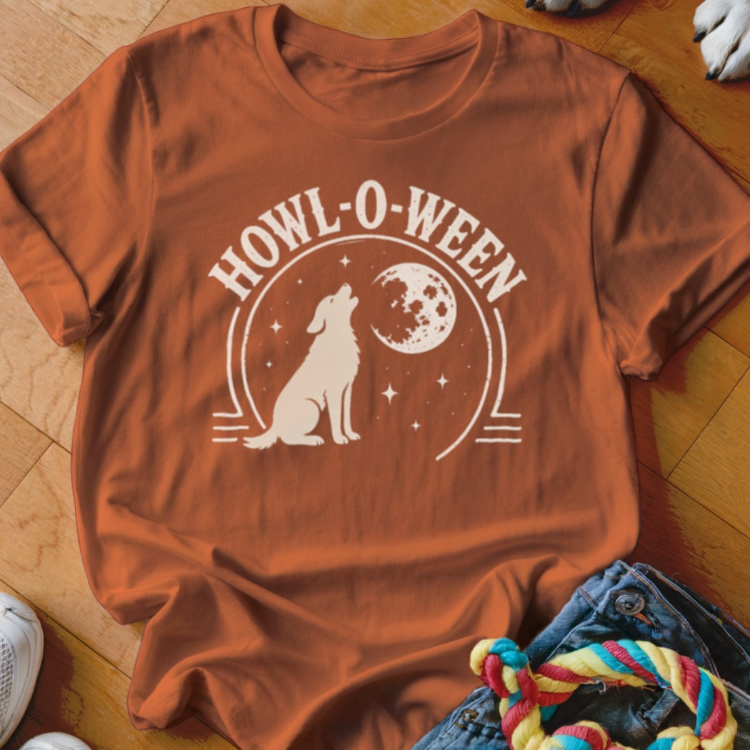 Orange t-shirt with white "HOWL-O-WEEN" graphic featuring a dog howling at the moon.