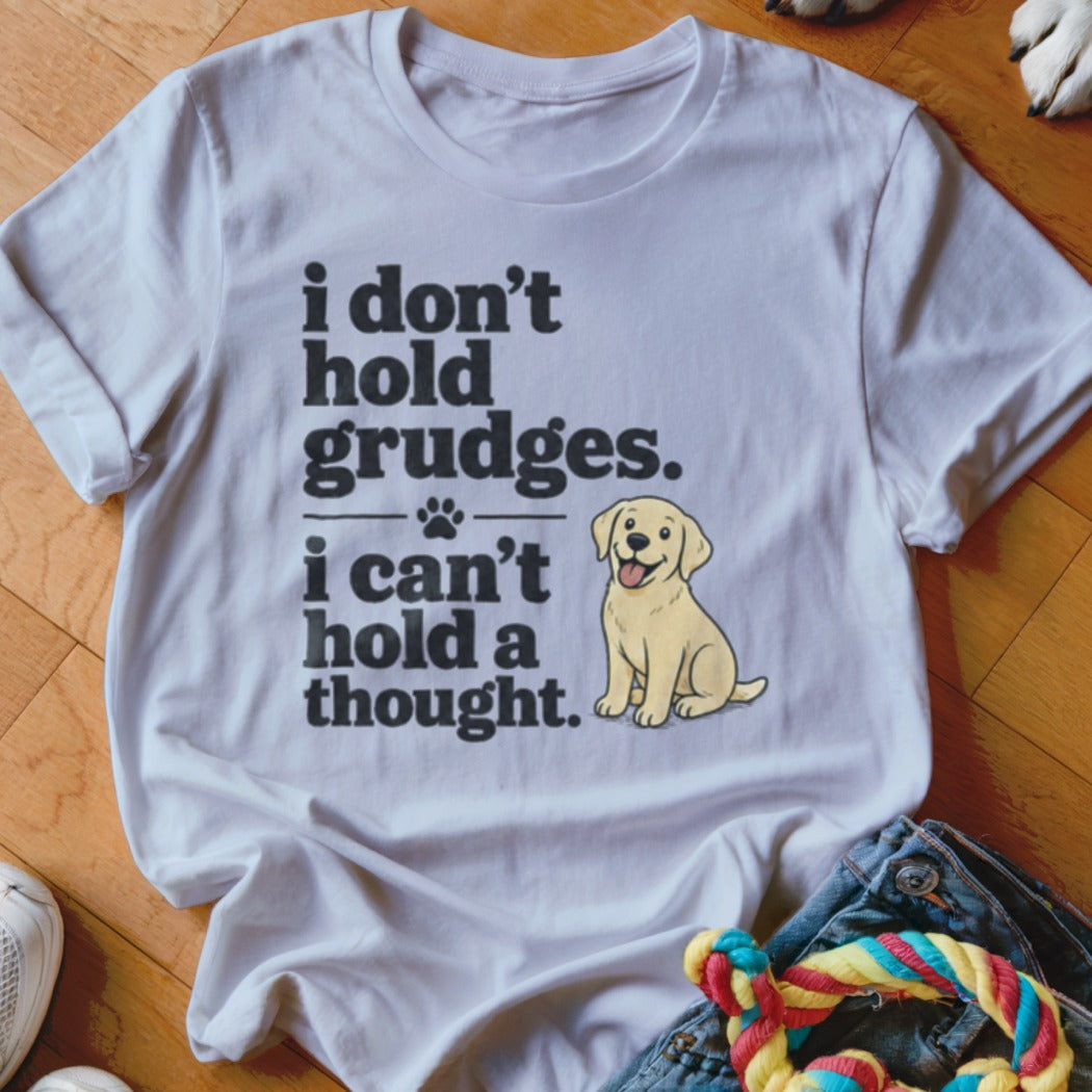 White t-shirt with text "i don't hold grudges. i can't hold a thought." and cartoon dog.