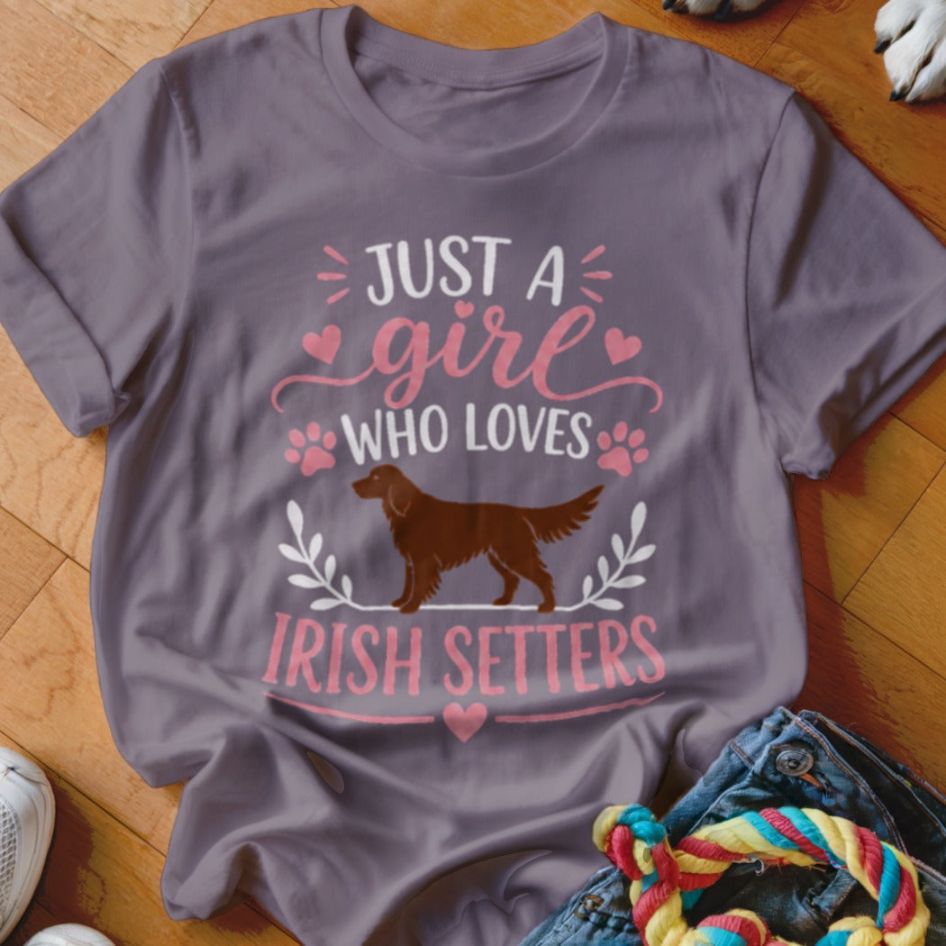Purple t-shirt with text "JUST A girl WHO LOVES IRISH SETTERS" and Irish Setter silhouette.