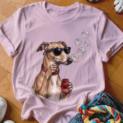 A light pink t-shirt features a graphic of a dog wearing sunglasses and blowing bubbles.