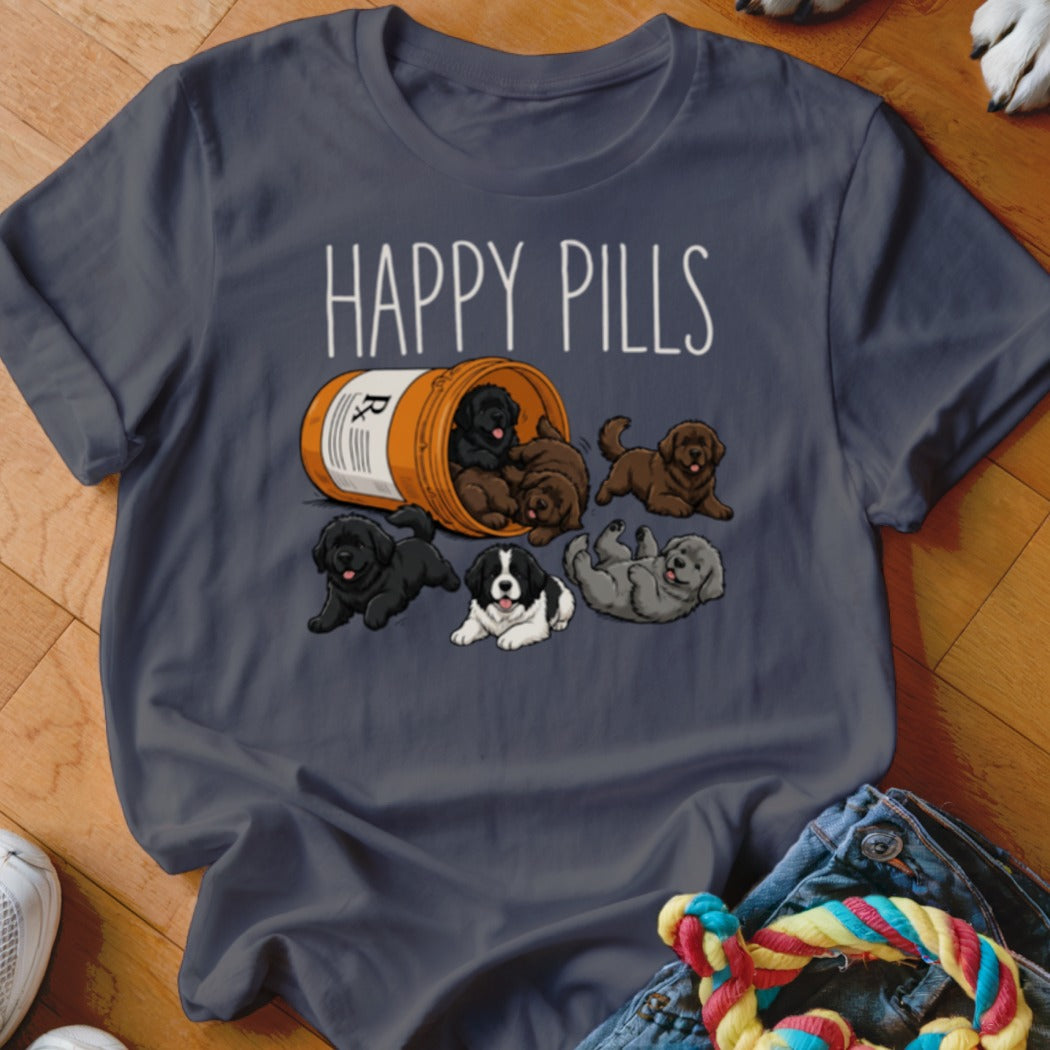 Dark t-shirt with "HAPPY PILLS" text and cartoon puppies spilling from a pill bottle.