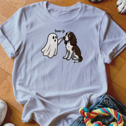 White t-shirt with cartoon ghost booping a brown and white dog, text "boo-p".