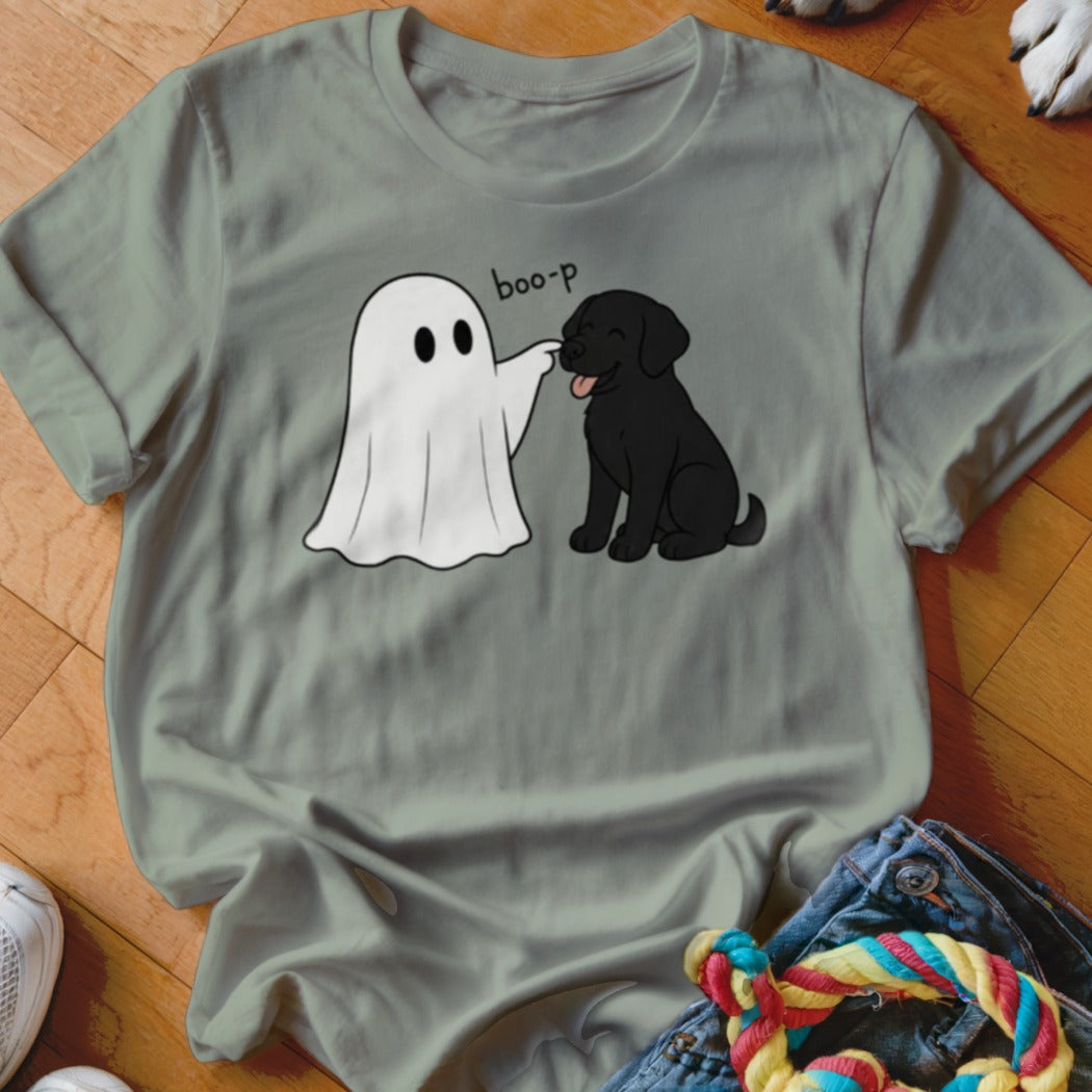 Ghost giving a black dog a "boo-p" on nose, graphic on t-shirt.
