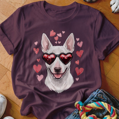 Maroon crewneck t-shirt featuring an illustration of a white bull terrier wearing heart-shaped sunglasses surrounded by pink hearts.