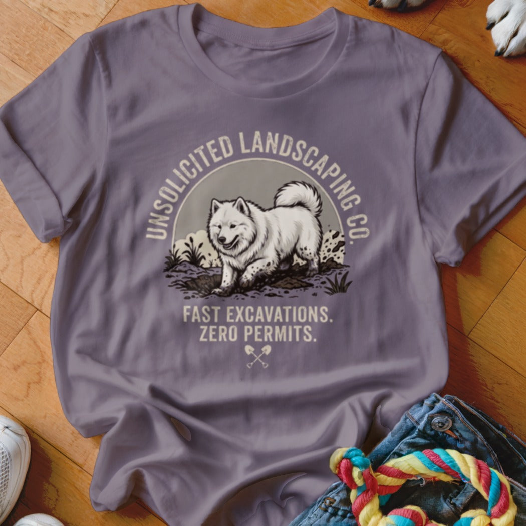 T-shirt graphic with a white dog digging and text "Unsolicited Landscaping Co. Fast Excavations. Zero Permits."