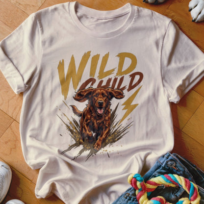 Light-colored t-shirt with a graphic of a running dog and the text WILD CHILD.