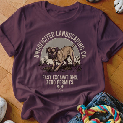 Maroon t-shirt with graphic of dog, "Unsolicited Landscaping Co.", and "Fast Excavations. Zero Permits."