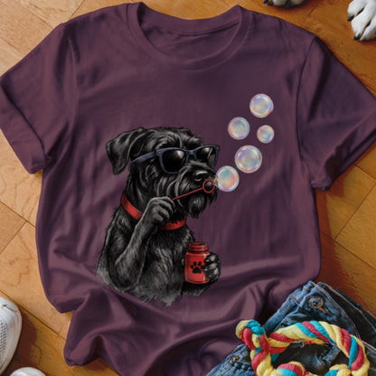 Dark purple t-shirt featuring a graphic of a black schnauzer wearing sunglasses and blowing bubbles.