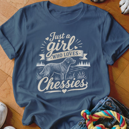 Blue t-shirt with "Just a girl who loves Chessies" and a dog graphic.