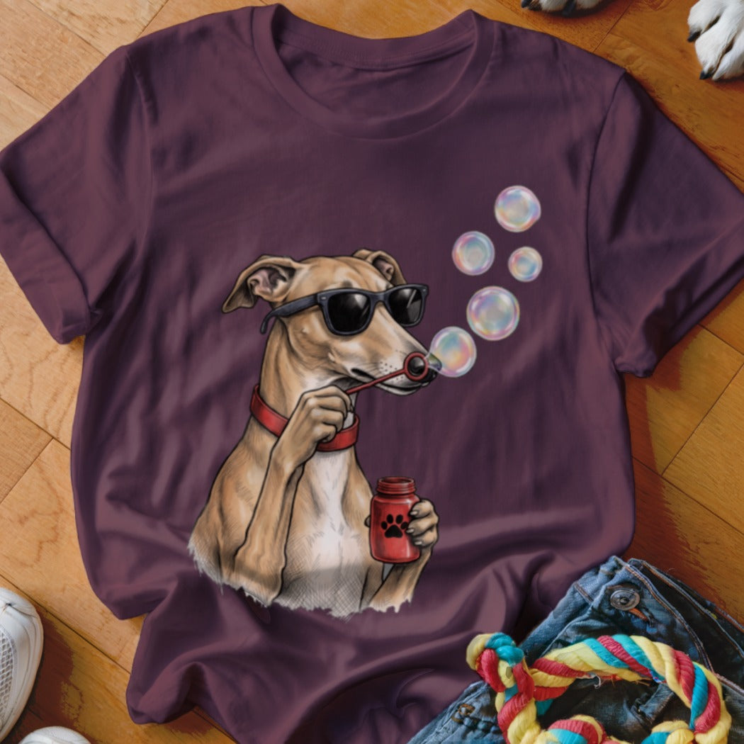 Dark maroon t-shirt featuring an illustration of a dog wearing sunglasses and blowing bubbles.