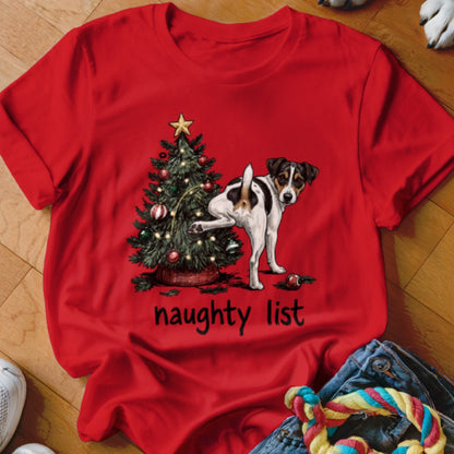 Red t-shirt with Christmas tree and dog lifting leg, "naughty list" text.