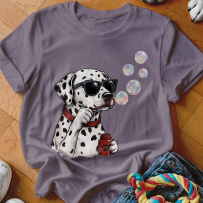 A mauve crew-neck t-shirt featuring a graphic of a Dalmatian wearing sunglasses and blowing bubbles.