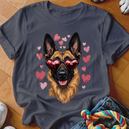 A dark gray t-shirt featuring a graphic of a German Shepherd wearing heart-shaped sunglasses surrounded by floating pink hearts.