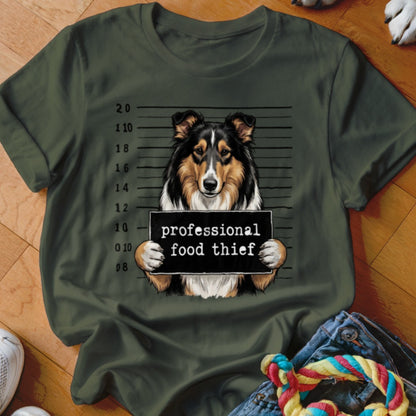 Collie dog mugshot with sign reading "professional food thief"