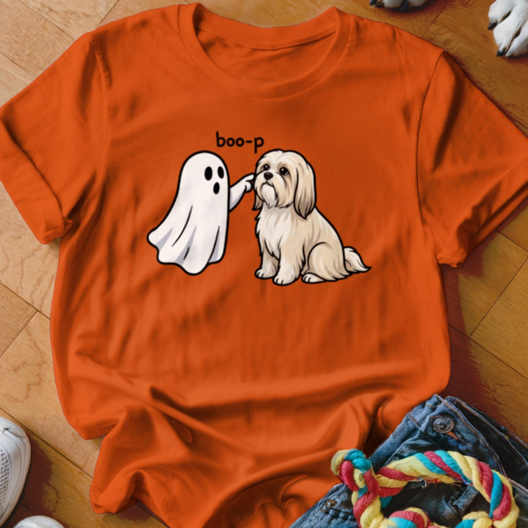 Ghost booping a Shih Tzu with the text "boo-p" on an orange shirt.