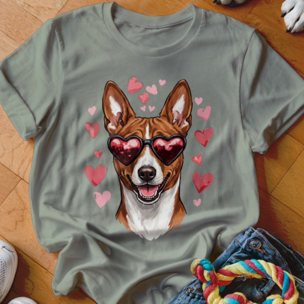 Sage green crewneck t-shirt featuring an illustrated brown and white dog wearing heart-shaped sunglasses, surrounded by pink hearts.