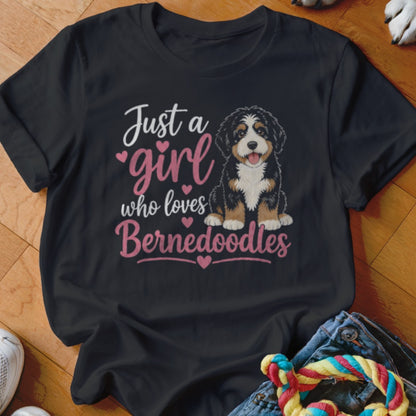 Black t-shirt with text "Just a girl who loves Bernedoodles" and a Bernedoodle dog illustration.