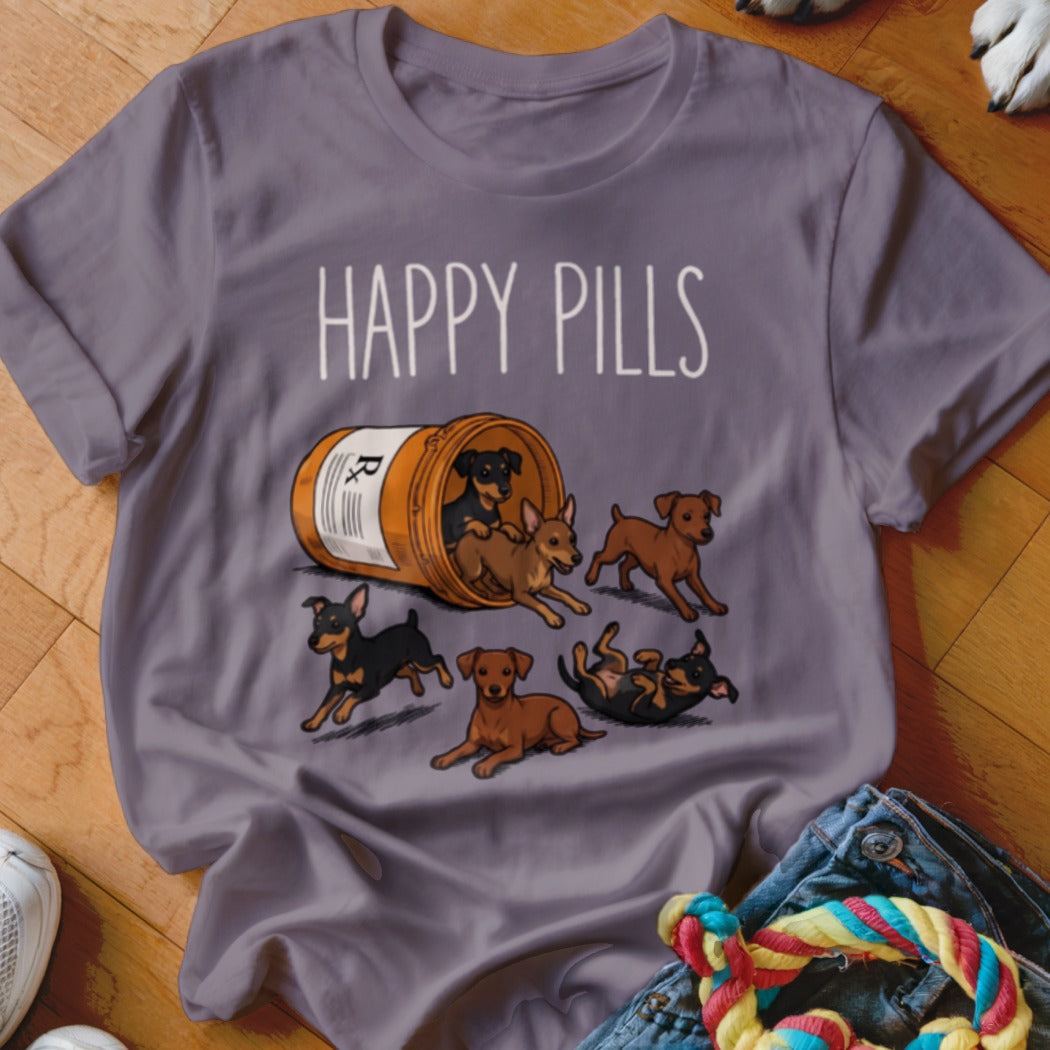 Shirt with "HAPPY PILLS" text and small dogs spilling from a pill bottle.