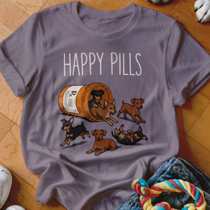 Shirt with "HAPPY PILLS" text and small dogs spilling from a pill bottle.