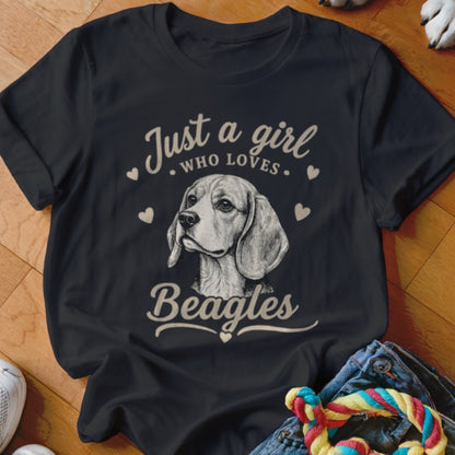 A black short-sleeved t-shirt featuring a sketched beagle portrait and text reading Just a girl who loves Beagles.