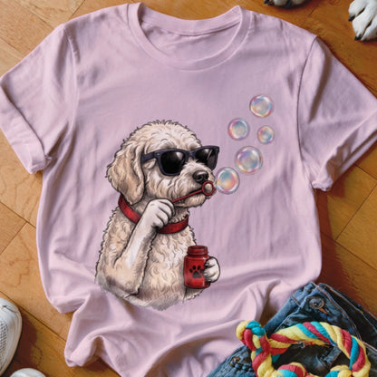 Light pink t-shirt featuring a cartoon doodle wearing sunglasses and blowing soap bubbles.