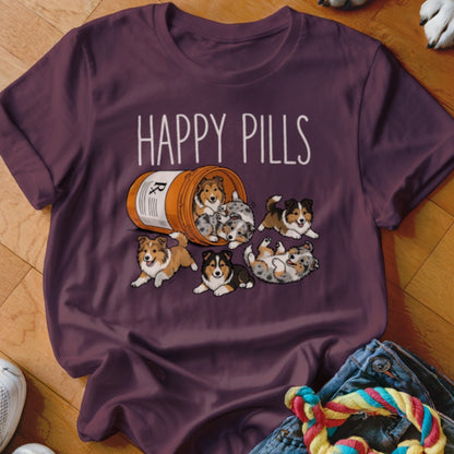 T-shirt with "Happy Pills" text and cartoon puppies spilling from a medicine bottle.