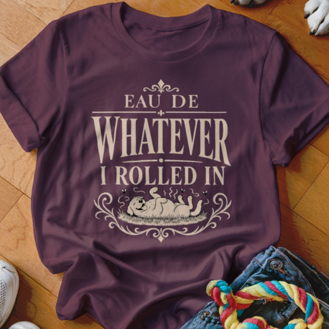 T-shirt with text "EAU DE WHATEVER I ROLLED IN" and a dog rolling in grass.