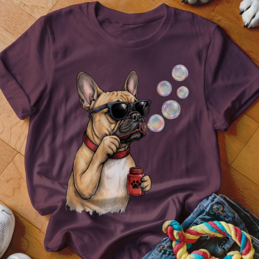 Dark maroon t-shirt featuring an illustration of a French Bulldog wearing sunglasses and blowing bubbles.