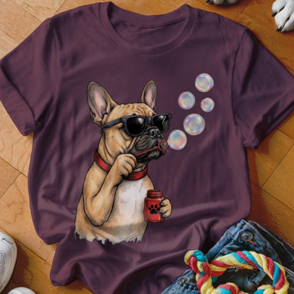 Dark maroon t-shirt featuring an illustration of a French Bulldog wearing sunglasses and blowing bubbles.