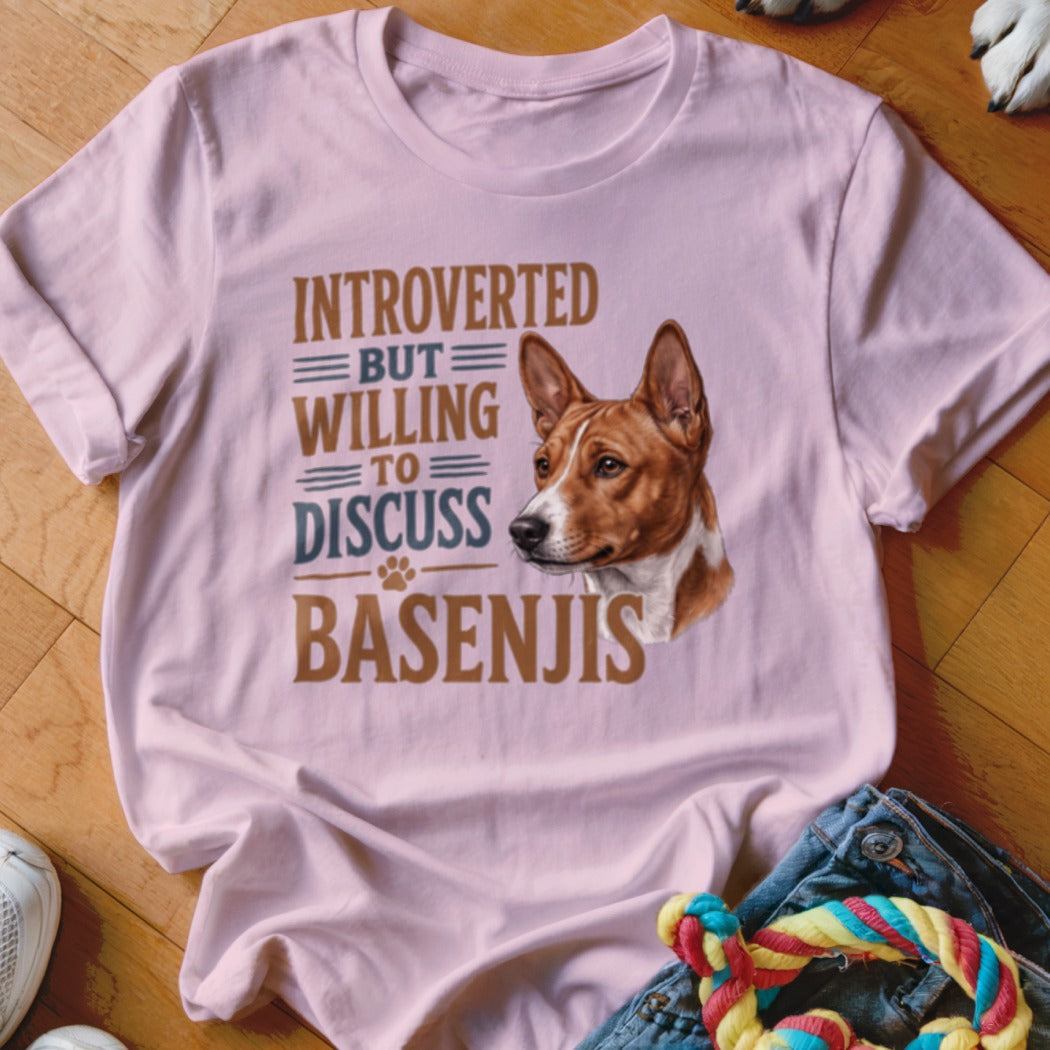 Pink t-shirt with "Introverted but willing to discuss Basenjis" text and Basenji dog portrait.